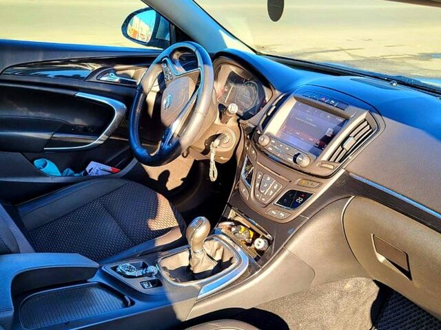 Серый Опель Инсигния, объемом двигателя 2 л и пробегом 294 тыс. км за 10500 $, фото 4 на Automoto.ua