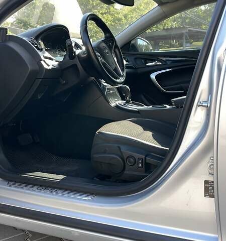 Сірий Опель Інсігнія, об'ємом двигуна 1.6 л та пробігом 198 тис. км за 11250 $, фото 6 на Automoto.ua