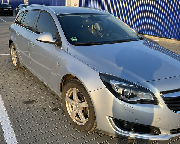 Серый Опель Инсигния, объемом двигателя 1.6 л и пробегом 200 тыс. км за 11800 $, фото 2 на Automoto.ua