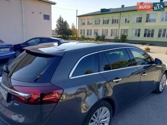 Серый Опель Инсигния, объемом двигателя 1.6 л и пробегом 248 тыс. км за 10999 $, фото 4 на Automoto.ua