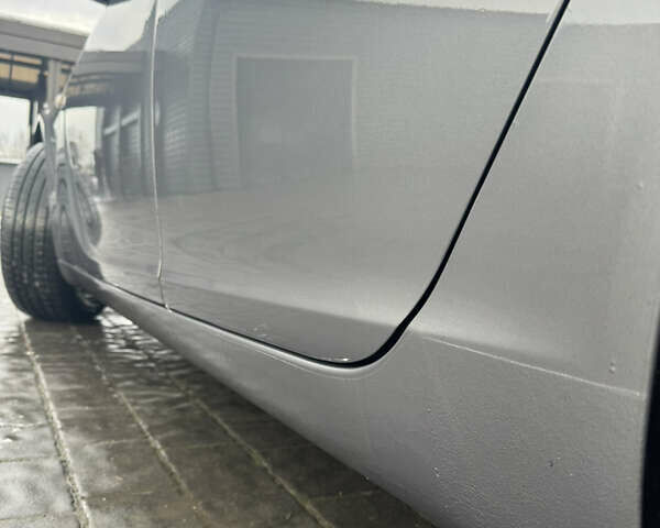 Сірий Опель Інсігнія, об'ємом двигуна 1.6 л та пробігом 258 тис. км за 10899 $, фото 6 на Automoto.ua