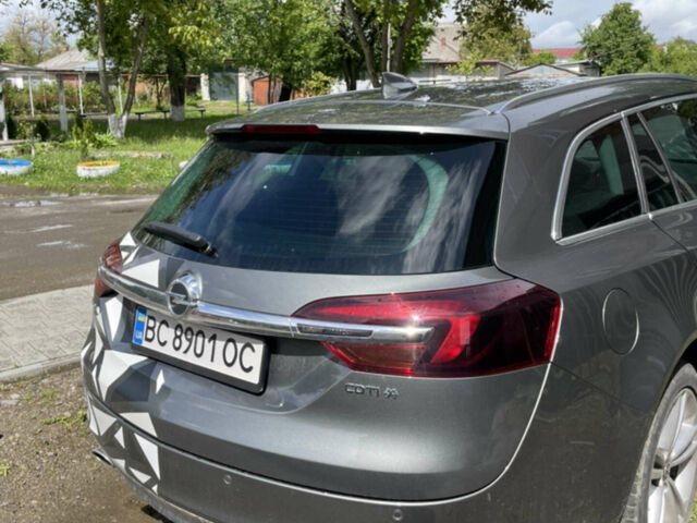 Серый Опель Инсигния, объемом двигателя 2 л и пробегом 259 тыс. км за 14000 $, фото 4 на Automoto.ua