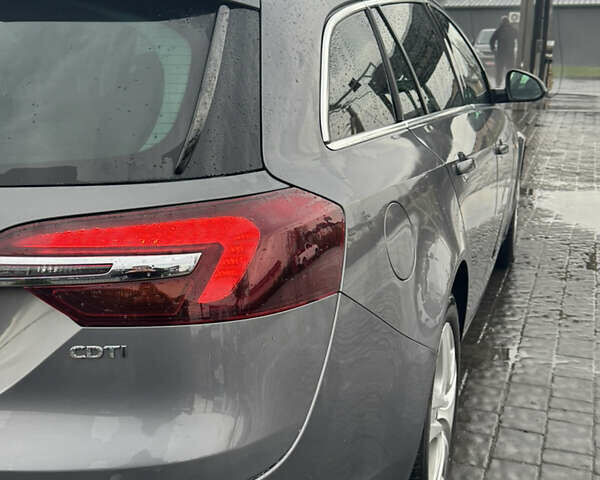 Сірий Опель Інсігнія, об'ємом двигуна 1.6 л та пробігом 258 тис. км за 10899 $, фото 3 на Automoto.ua