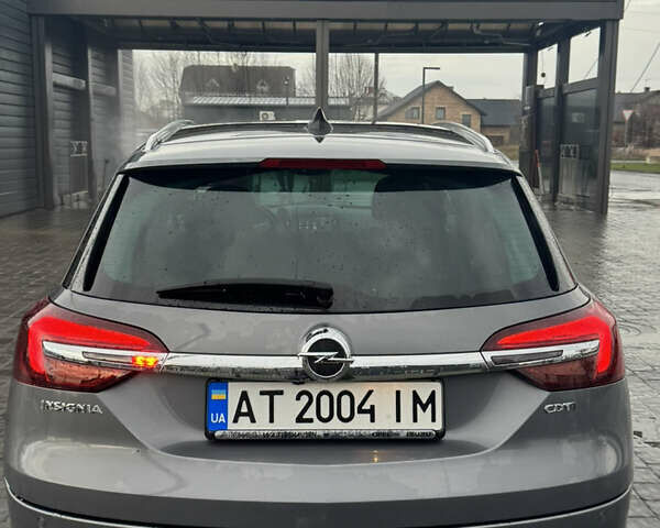 Сірий Опель Інсігнія, об'ємом двигуна 1.6 л та пробігом 258 тис. км за 10899 $, фото 5 на Automoto.ua