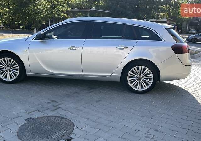 Сірий Опель Інсігнія, об'ємом двигуна 1.6 л та пробігом 198 тис. км за 11250 $, фото 4 на Automoto.ua