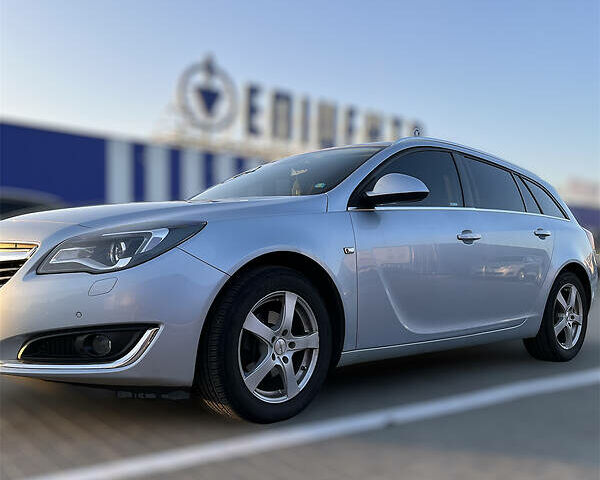 Серый Опель Инсигния, объемом двигателя 1.6 л и пробегом 200 тыс. км за 11800 $, фото 1 на Automoto.ua