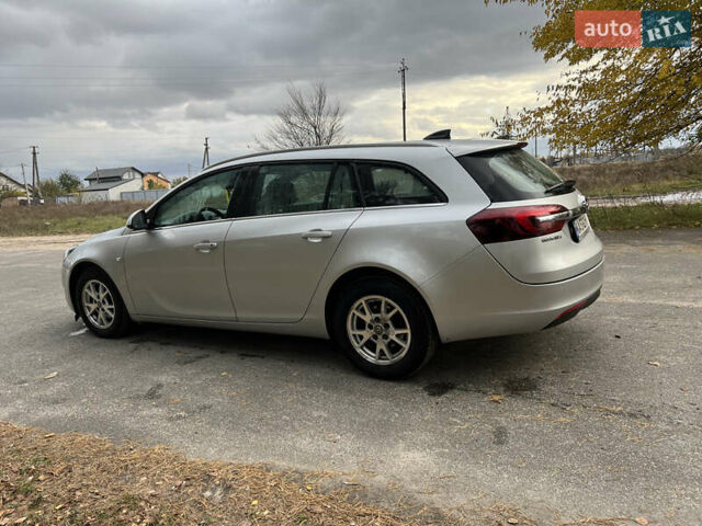 Сірий Опель Інсігнія, об'ємом двигуна 1.6 л та пробігом 250 тис. км за 10500 $, фото 3 на Automoto.ua