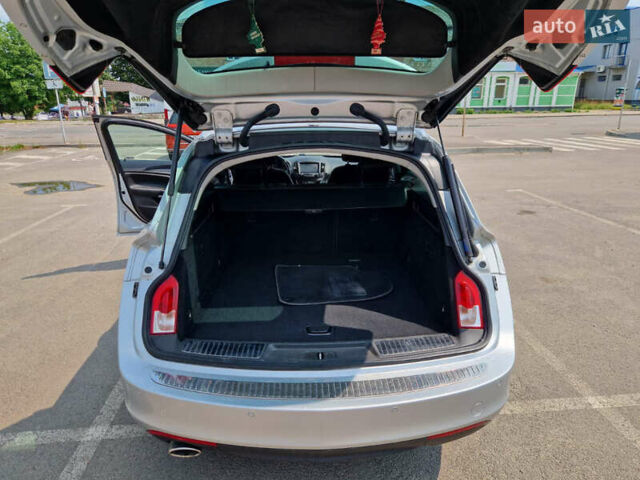 Серый Опель Инсигния, объемом двигателя 2 л и пробегом 208 тыс. км за 12900 $, фото 6 на Automoto.ua