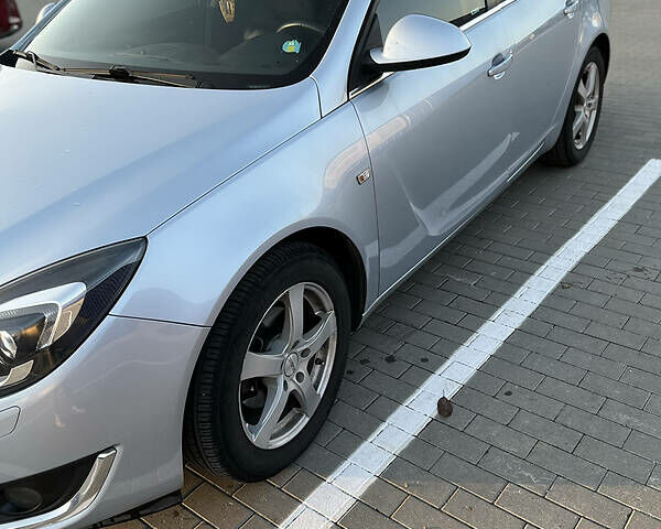 Серый Опель Инсигния, объемом двигателя 1.6 л и пробегом 200 тыс. км за 11800 $, фото 4 на Automoto.ua