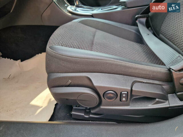 Серый Опель Инсигния, объемом двигателя 2 л и пробегом 208 тыс. км за 12900 $, фото 17 на Automoto.ua