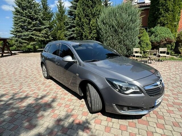 Серый Опель Инсигния, объемом двигателя 2 л и пробегом 246 тыс. км за 11700 $, фото 1 на Automoto.ua