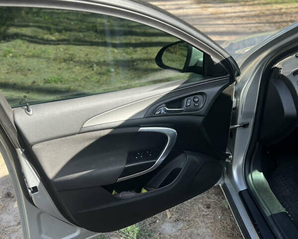 Серый Опель Инсигния, объемом двигателя 1.6 л и пробегом 224 тыс. км за 11500 $, фото 7 на Automoto.ua