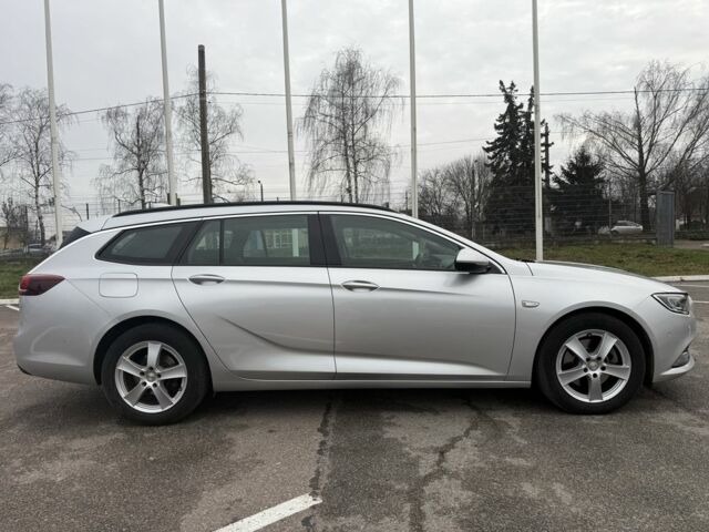 Серый Опель Инсигния, объемом двигателя 2 л и пробегом 213 тыс. км за 14300 $, фото 3 на Automoto.ua