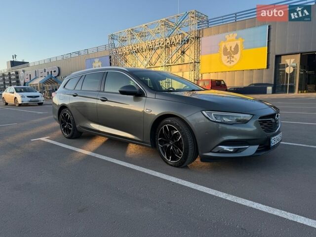 Серый Опель Инсигния, объемом двигателя 2 л и пробегом 245 тыс. км за 15099 $, фото 16 на Automoto.ua