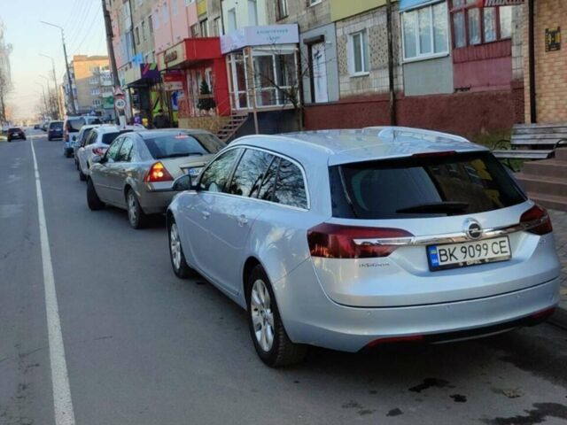 Сірий Опель Інсігнія, об'ємом двигуна 1.6 л та пробігом 215 тис. км за 11400 $, фото 3 на Automoto.ua