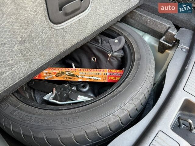 Сірий Опель Інсігнія, об'ємом двигуна 1.6 л та пробігом 255 тис. км за 12950 $, фото 30 на Automoto.ua