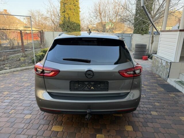 Серый Опель Инсигния, объемом двигателя 1.6 л и пробегом 255 тыс. км за 12950 $, фото 4 на Automoto.ua