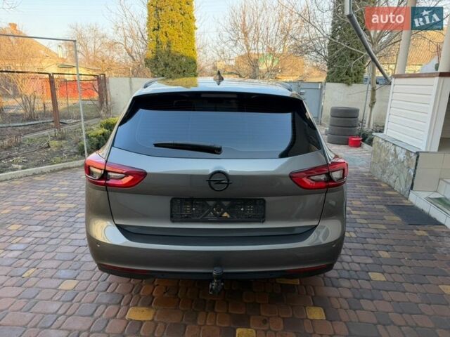 Серый Опель Инсигния, объемом двигателя 1.6 л и пробегом 255 тыс. км за 12950 $, фото 4 на Automoto.ua