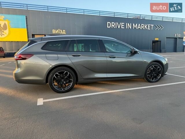 Серый Опель Инсигния, объемом двигателя 2 л и пробегом 245 тыс. км за 15099 $, фото 13 на Automoto.ua