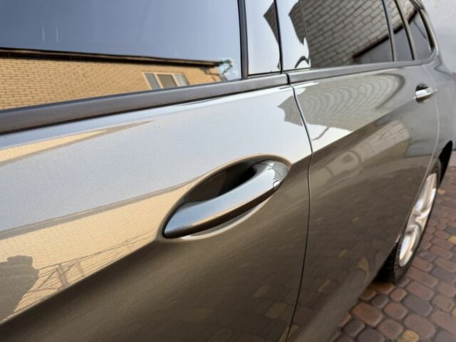 Серый Опель Инсигния, объемом двигателя 1.6 л и пробегом 255 тыс. км за 12950 $, фото 7 на Automoto.ua