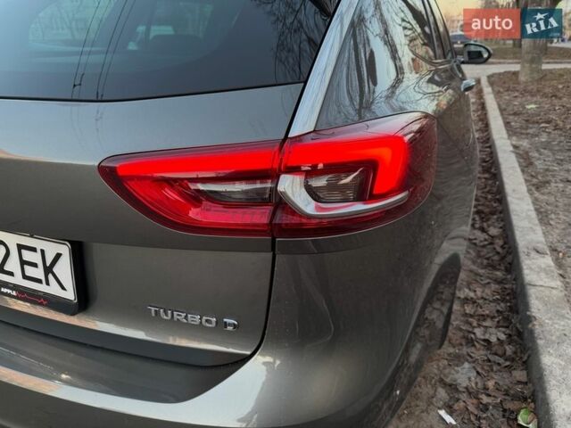 Серый Опель Инсигния, объемом двигателя 2 л и пробегом 245 тыс. км за 15099 $, фото 27 на Automoto.ua