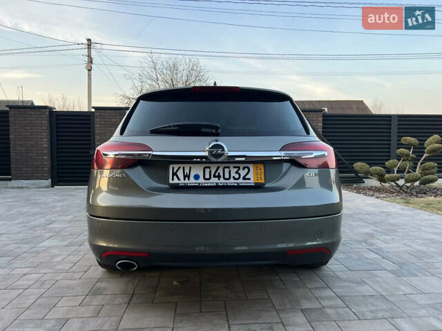 Серый Опель Инсигния, объемом двигателя 2 л и пробегом 192 тыс. км за 11999 $, фото 7 на Automoto.ua