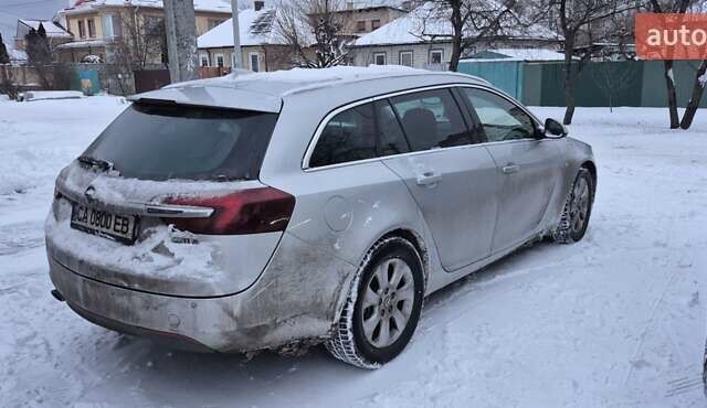 Серый Опель Инсигния, объемом двигателя 2 л и пробегом 120 тыс. км за 10300 $, фото 3 на Automoto.ua