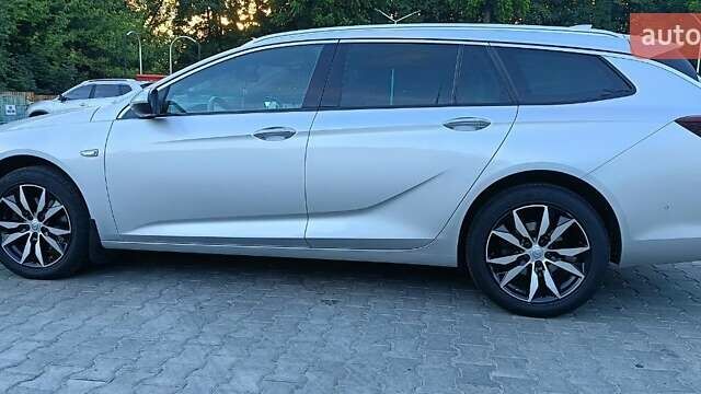 Серый Опель Инсигния, объемом двигателя 2 л и пробегом 224 тыс. км за 15100 $, фото 6 на Automoto.ua