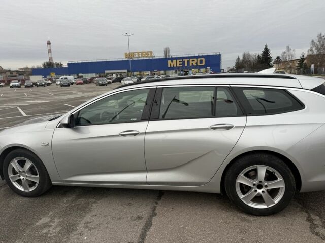 Серый Опель Инсигния, объемом двигателя 2 л и пробегом 213 тыс. км за 14300 $, фото 4 на Automoto.ua