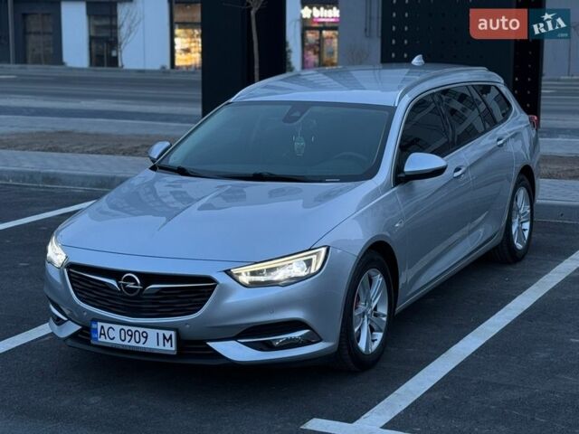 Сірий Опель Інсігнія, об'ємом двигуна 1.96 л та пробігом 210 тис. км за 14800 $, фото 5 на Automoto.ua