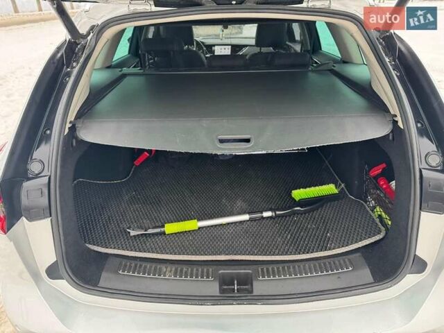 Серый Опель Инсигния, объемом двигателя 1.96 л и пробегом 209 тыс. км за 15700 $, фото 14 на Automoto.ua