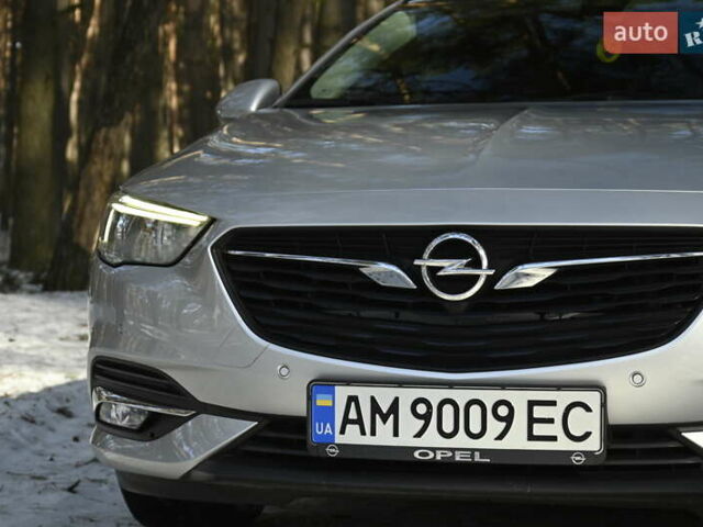 Сірий Опель Інсігнія, об'ємом двигуна 1.96 л та пробігом 114 тис. км за 16800 $, фото 7 на Automoto.ua