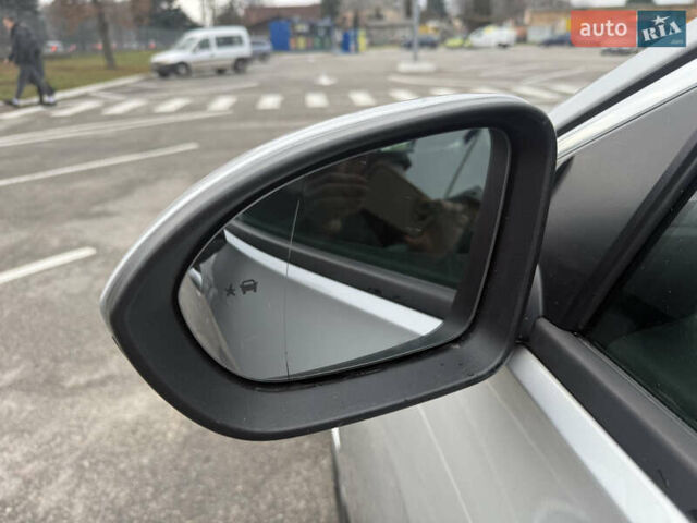 Серый Опель Инсигния, объемом двигателя 2 л и пробегом 213 тыс. км за 13900 $, фото 6 на Automoto.ua