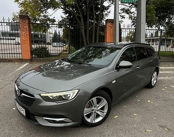 Серый Опель Инсигния, объемом двигателя 2 л и пробегом 209 тыс. км за 13800 $, фото 19 на Automoto.ua