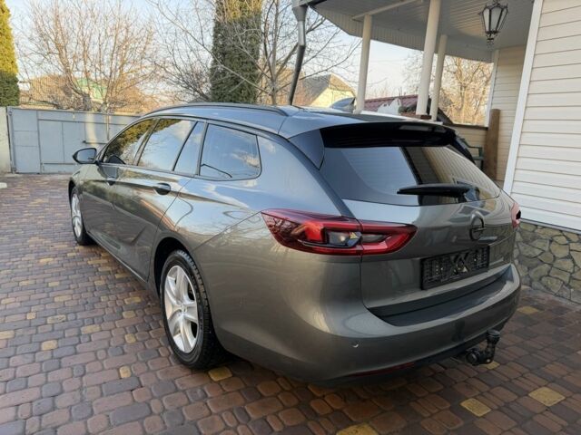 Серый Опель Инсигния, объемом двигателя 1.6 л и пробегом 255 тыс. км за 12950 $, фото 2 на Automoto.ua