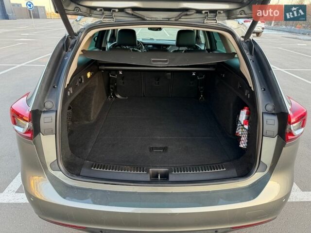 Серый Опель Инсигния, объемом двигателя 2 л и пробегом 245 тыс. км за 15099 $, фото 37 на Automoto.ua