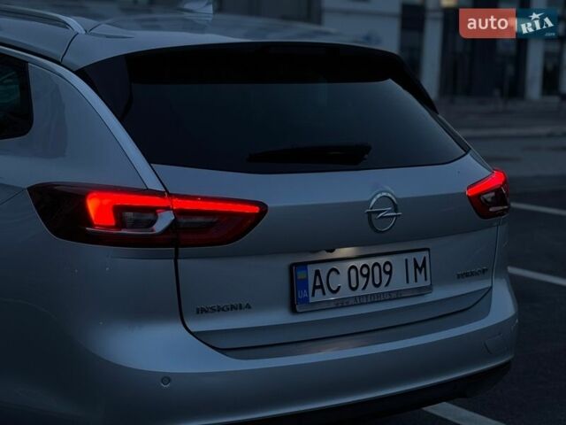 Сірий Опель Інсігнія, об'ємом двигуна 1.96 л та пробігом 210 тис. км за 14800 $, фото 11 на Automoto.ua