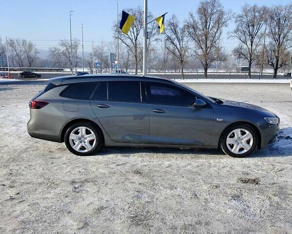 Серый Опель Инсигния, объемом двигателя 1.6 л и пробегом 255 тыс. км за 13400 $, фото 4 на Automoto.ua