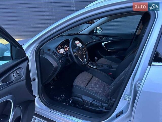 Серый Опель Инсигния, объемом двигателя 1.6 л и пробегом 211 тыс. км за 11500 $, фото 4 на Automoto.ua