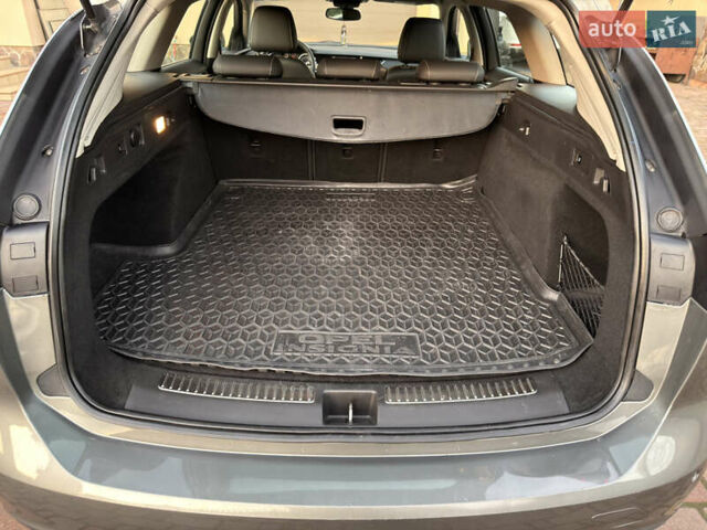 Серый Опель Инсигния, объемом двигателя 1.6 л и пробегом 169 тыс. км за 13900 $, фото 62 на Automoto.ua