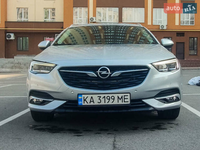 Серый Опель Инсигния, объемом двигателя 1.6 л и пробегом 186 тыс. км за 15000 $, фото 2 на Automoto.ua