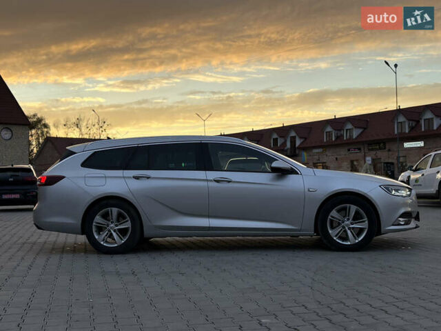 Серый Опель Инсигния, объемом двигателя 1.96 л и пробегом 210 тыс. км за 15250 $, фото 2 на Automoto.ua