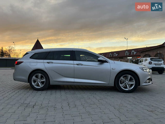 Серый Опель Инсигния, объемом двигателя 1.96 л и пробегом 210 тыс. км за 15250 $, фото 7 на Automoto.ua