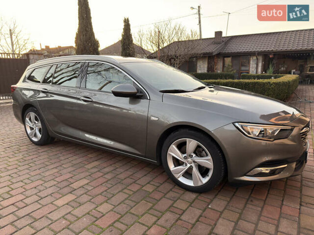 Серый Опель Инсигния, объемом двигателя 1.6 л и пробегом 169 тыс. км за 13900 $, фото 7 на Automoto.ua