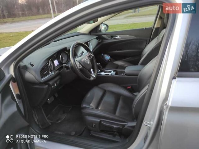 Сірий Опель Інсігнія, об'ємом двигуна 1.6 л та пробігом 230 тис. км за 15499 $, фото 12 на Automoto.ua