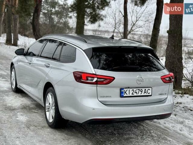 Сірий Опель Інсігнія, об'ємом двигуна 2 л та пробігом 207 тис. км за 12300 $, фото 3 на Automoto.ua