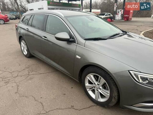 Серый Опель Инсигния, объемом двигателя 1.6 л и пробегом 237 тыс. км за 14200 $, фото 1 на Automoto.ua