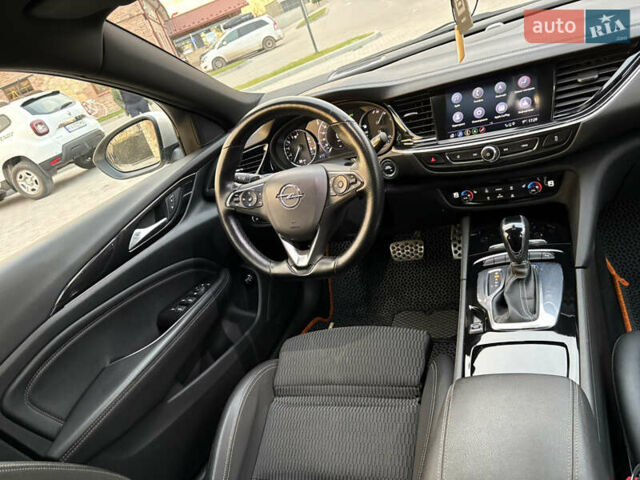 Серый Опель Инсигния, объемом двигателя 1.96 л и пробегом 210 тыс. км за 15250 $, фото 48 на Automoto.ua