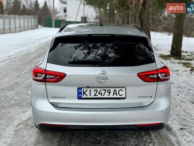 Серый Опель Инсигния, объемом двигателя 2 л и пробегом 207 тыс. км за 13800 $, фото 4 на Automoto.ua