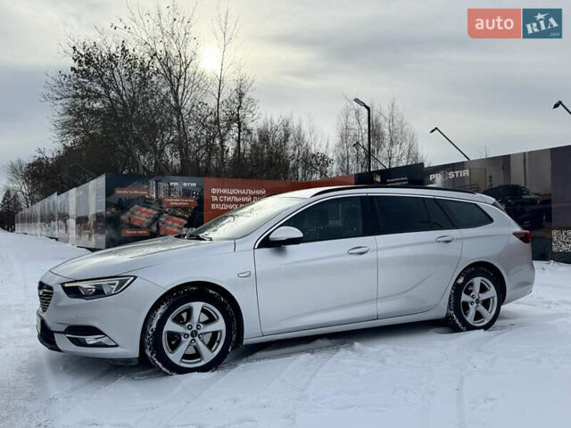 Сірий Опель Інсігнія, об'ємом двигуна 1.6 л та пробігом 235 тис. км за 12900 $, фото 2 на Automoto.ua